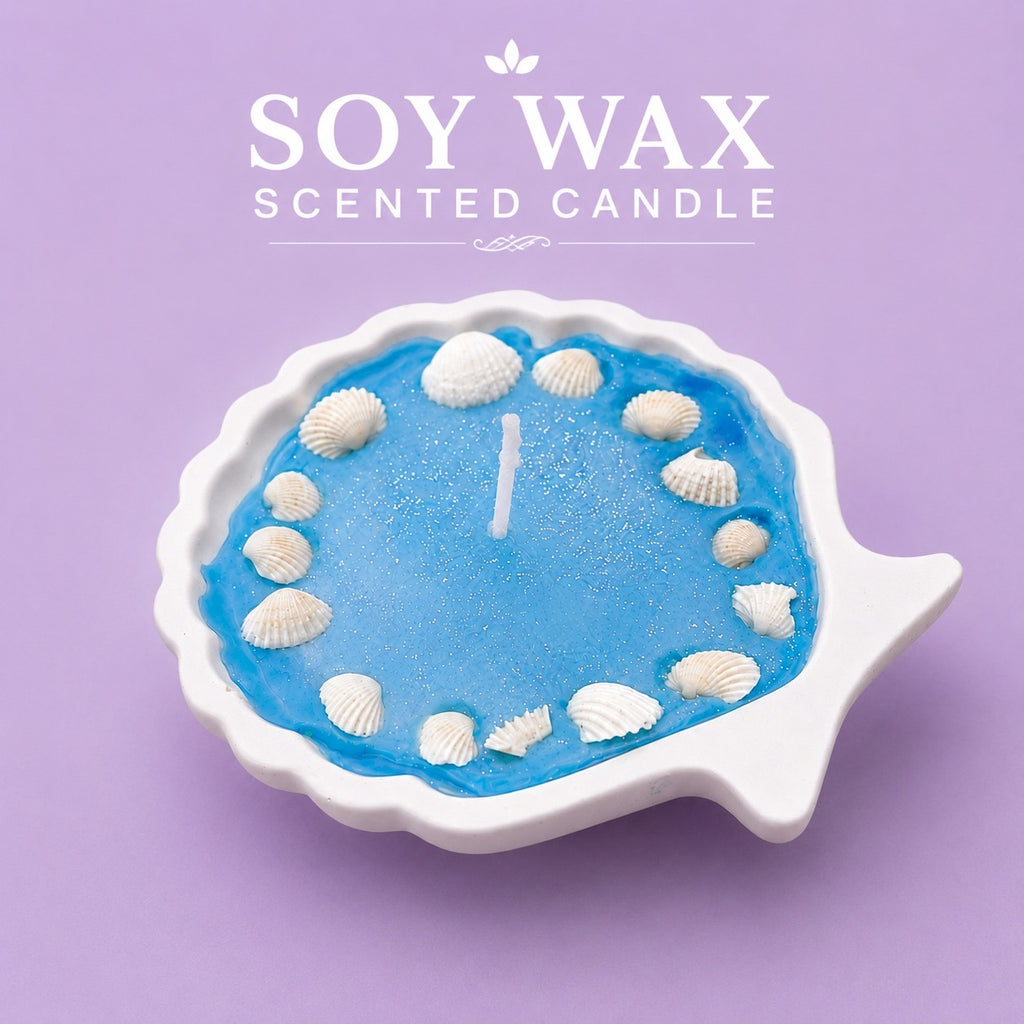 Ocean Shell Soy Wax Scented Candle styled with seashells and dried flowers