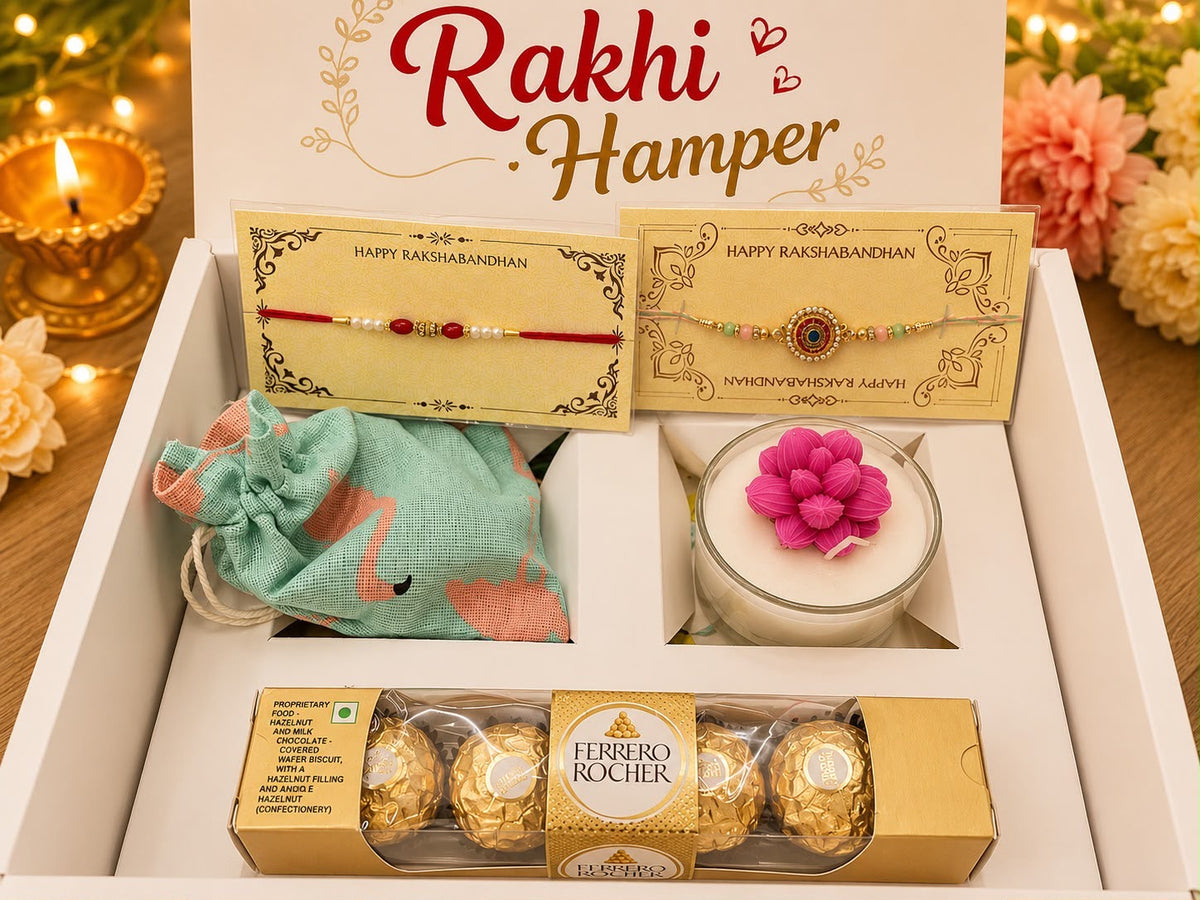 Rakhi Hamper with 2 Rakhis, flower candle, traditional potli and Ferrero Rocher in a premium white gift box