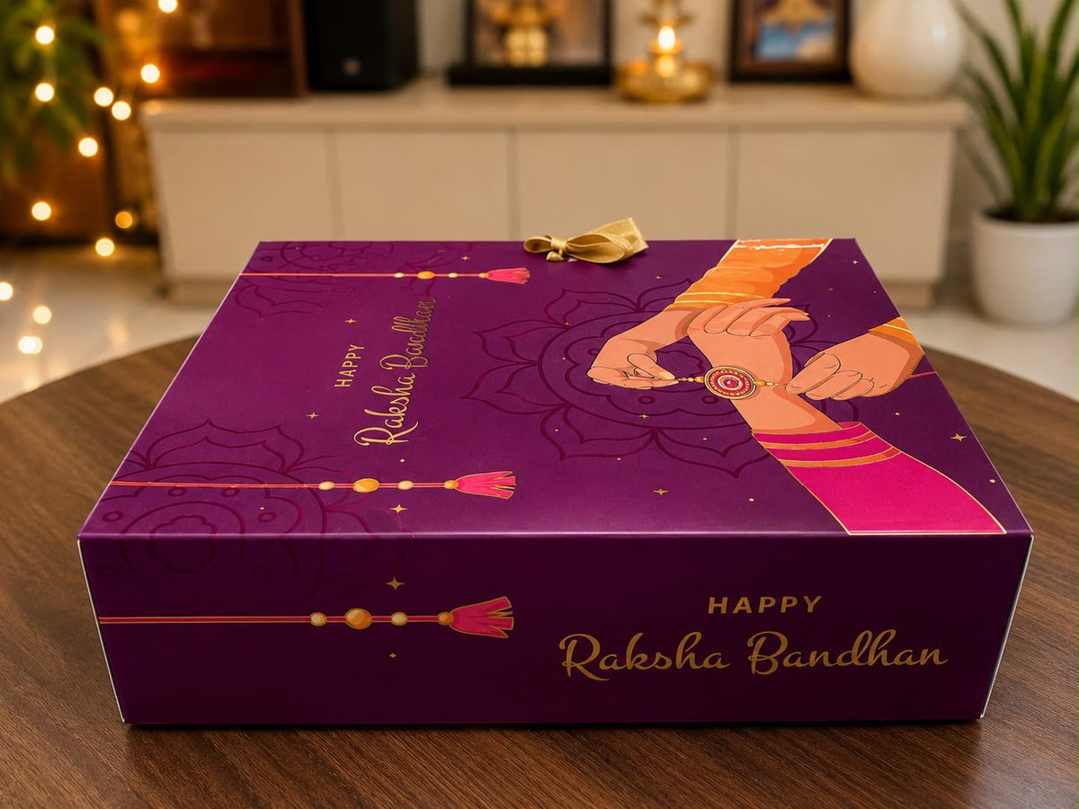 Rakhi Hamper | 2 Rakhis, Flower Candle, Traditional Potli & Ferrero Rocher | Premium Gift Box