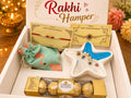 Rakhi Hamper with 2 Happy Rakshabandhan Rakhi cards, handcrafted ocean-themed star resin tray with dry fruits, green fabric dry fruit potli and Ferrero Rocher chocolates in a white branded gift box