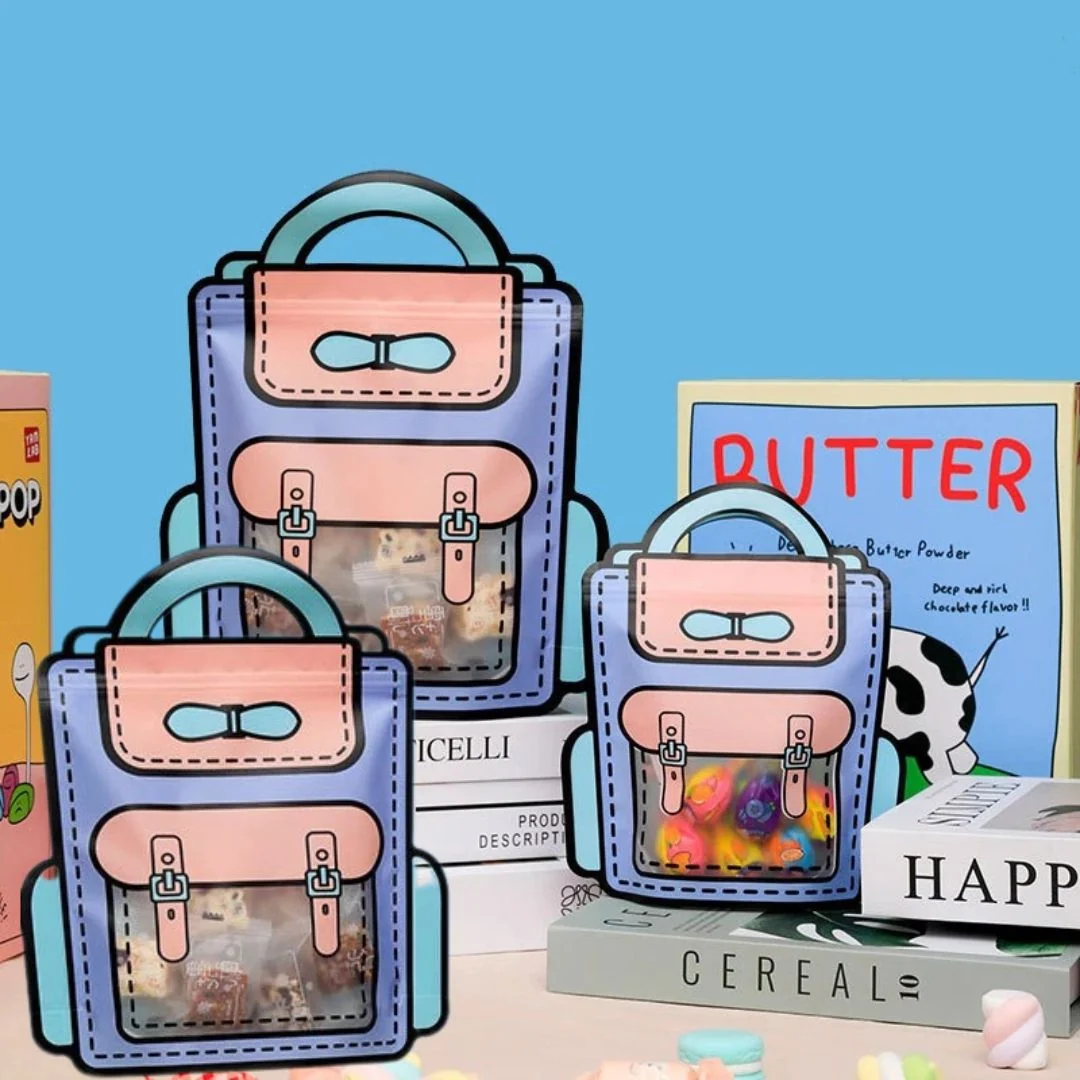 Three pastel purple and pink cartoon satchel design ziplock gift bags in different sizes filled with candies