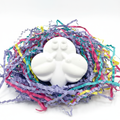 White plaster ghost cloud figure on clean white background with soft shadows