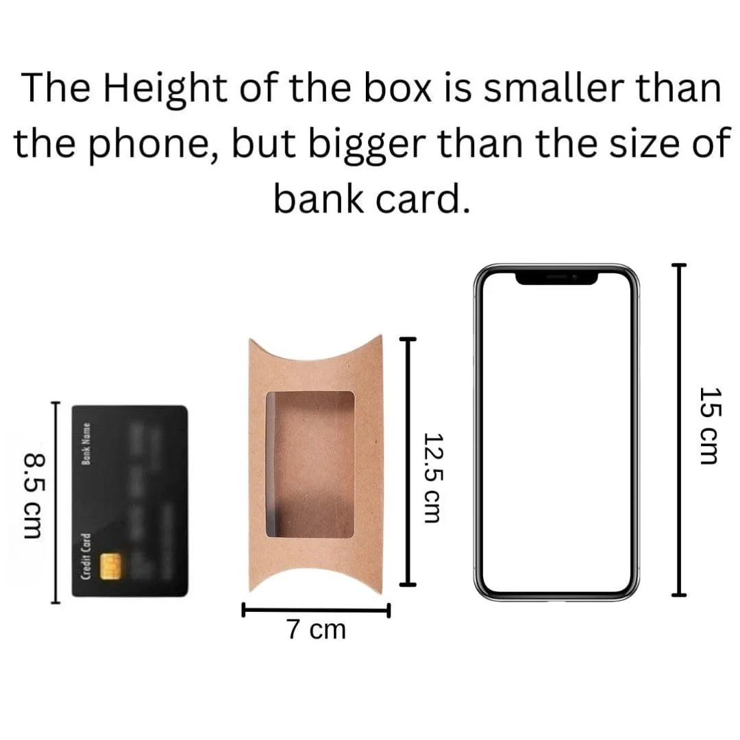 Size reference of kraft pillow box - 12.5cm x 7cm compared to bank card and smartphone