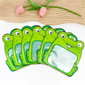Set of frog cartoon goodie bags with transparent window fanned out