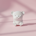 Teddy bear plaster fridge magnet figure on pink background